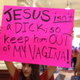 Image for article titled Super Cool Dad Defends Daughter's ‘Keep Jesus Out of My Vagina' Poster